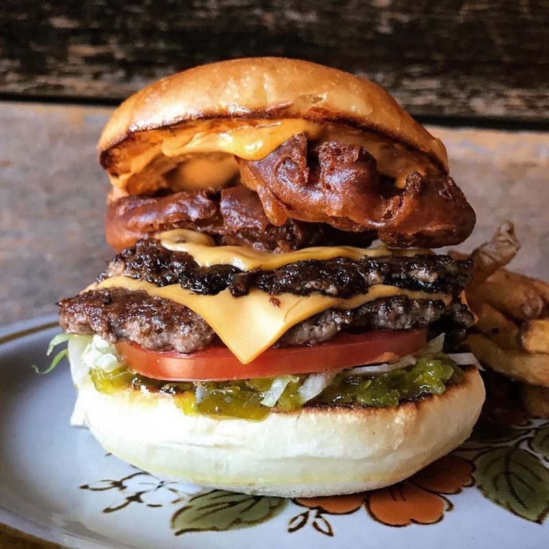 Double Cheeseburger Topped With Onion Rings