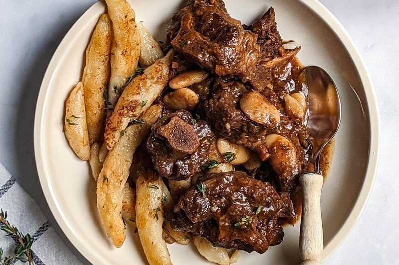 Jamaican Braised Oxtail With Buttered Spinners
